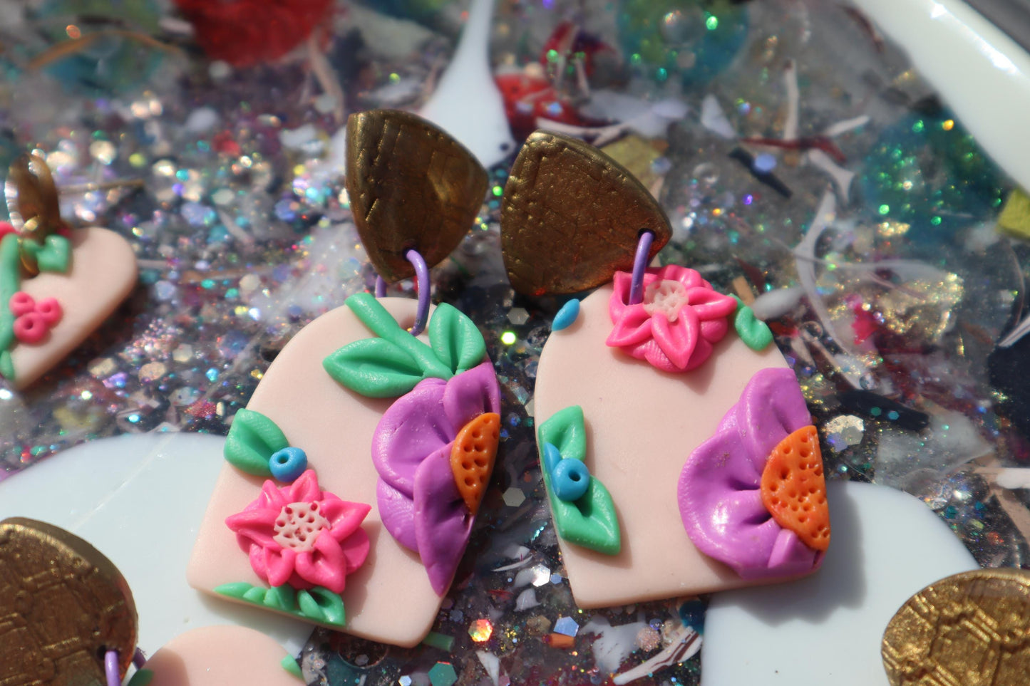 VC pick ‘a’ mix dangles. Mixed media. Have small flaws. All are discounted and have nickel free findings and resin backs
