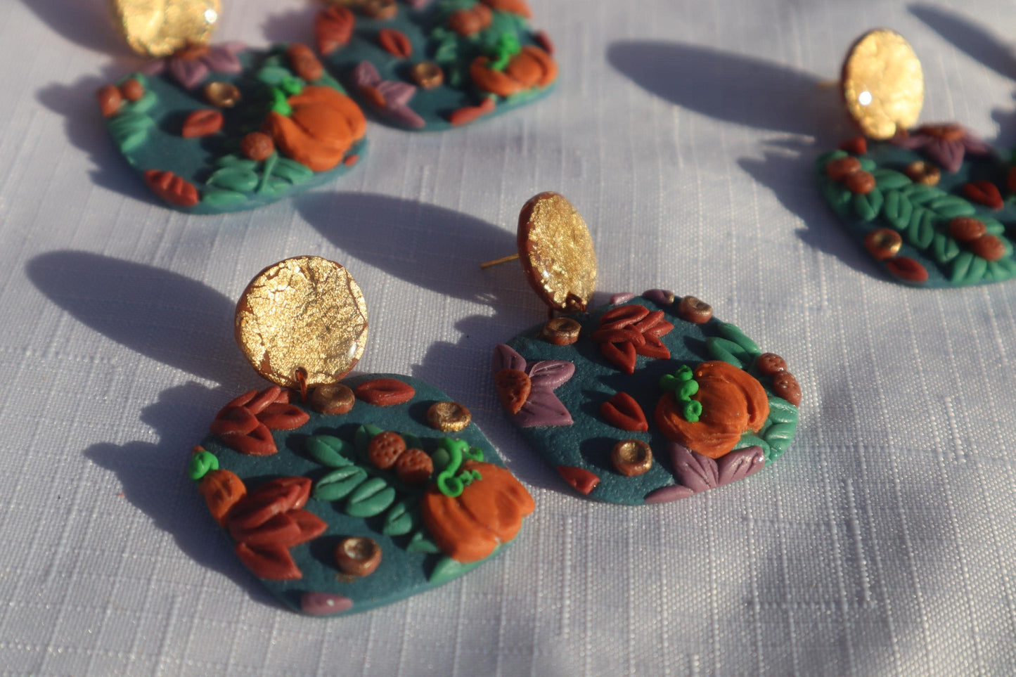 Halloween inspired pumpkin patch dangles,polymer clay lightweight with resin, handmade beautiful earrings, Nickel free findings. Seconds
