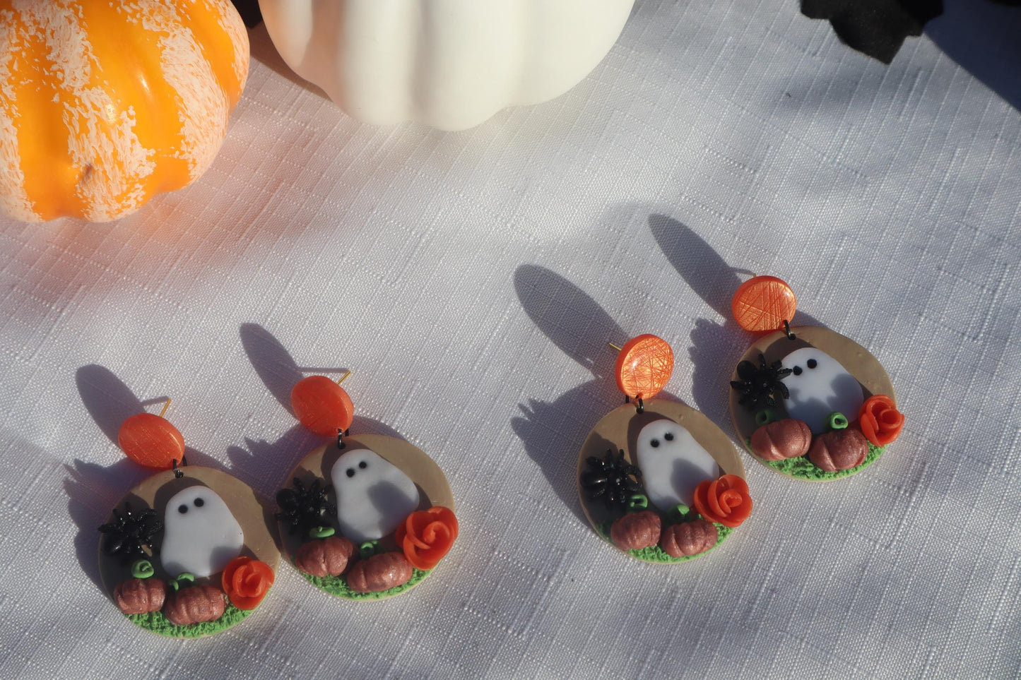 Halloween inspired pumpkin ghost limited edition ,polymer clay lightweight with resin, handmade beautiful earrings, Nickel free findings.