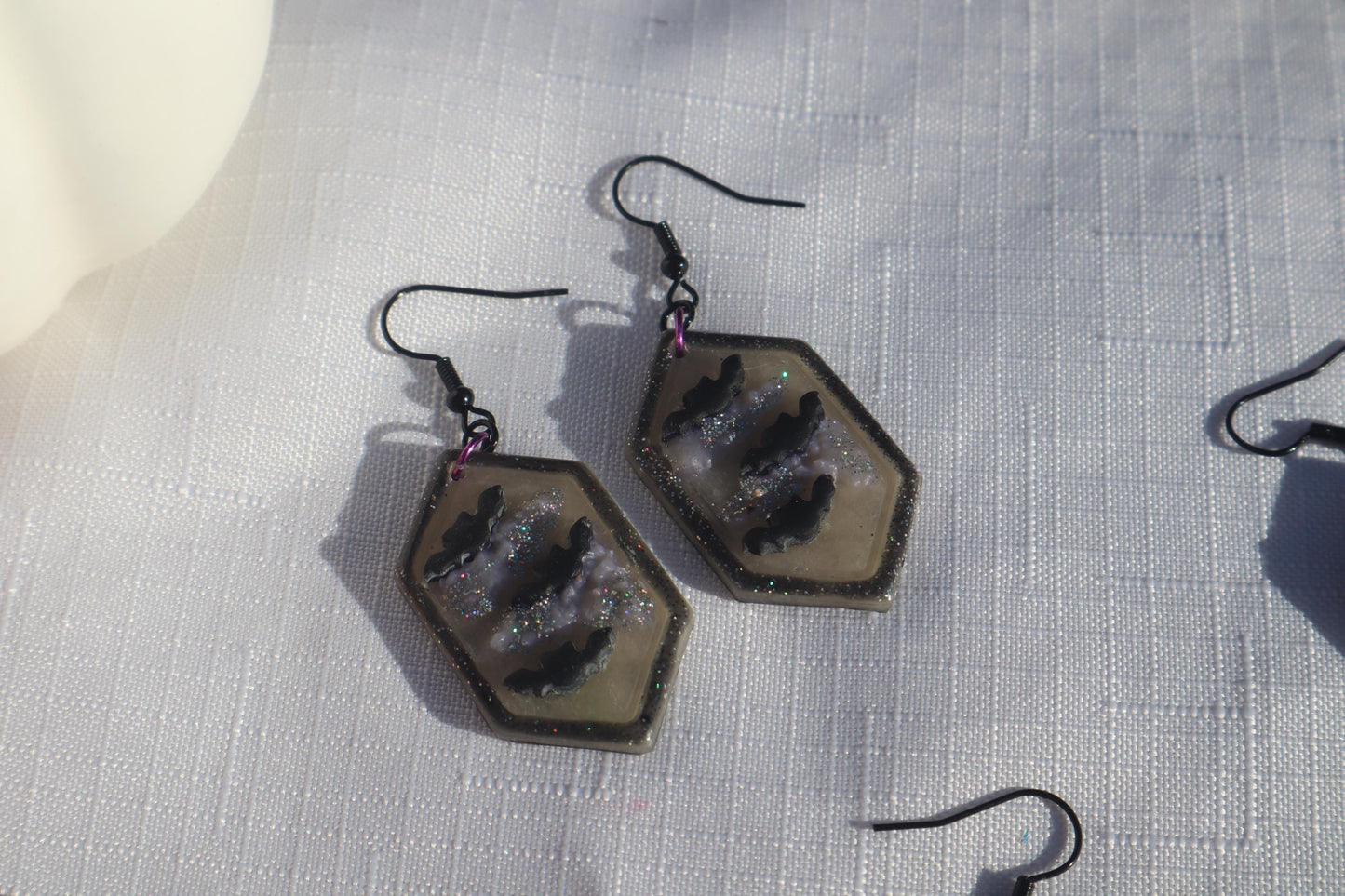 Halloween inspired dangles,polymer clay lightweight with resin, handmade beautiful earrings, Nickel free findings. Bats and floral pumpkins