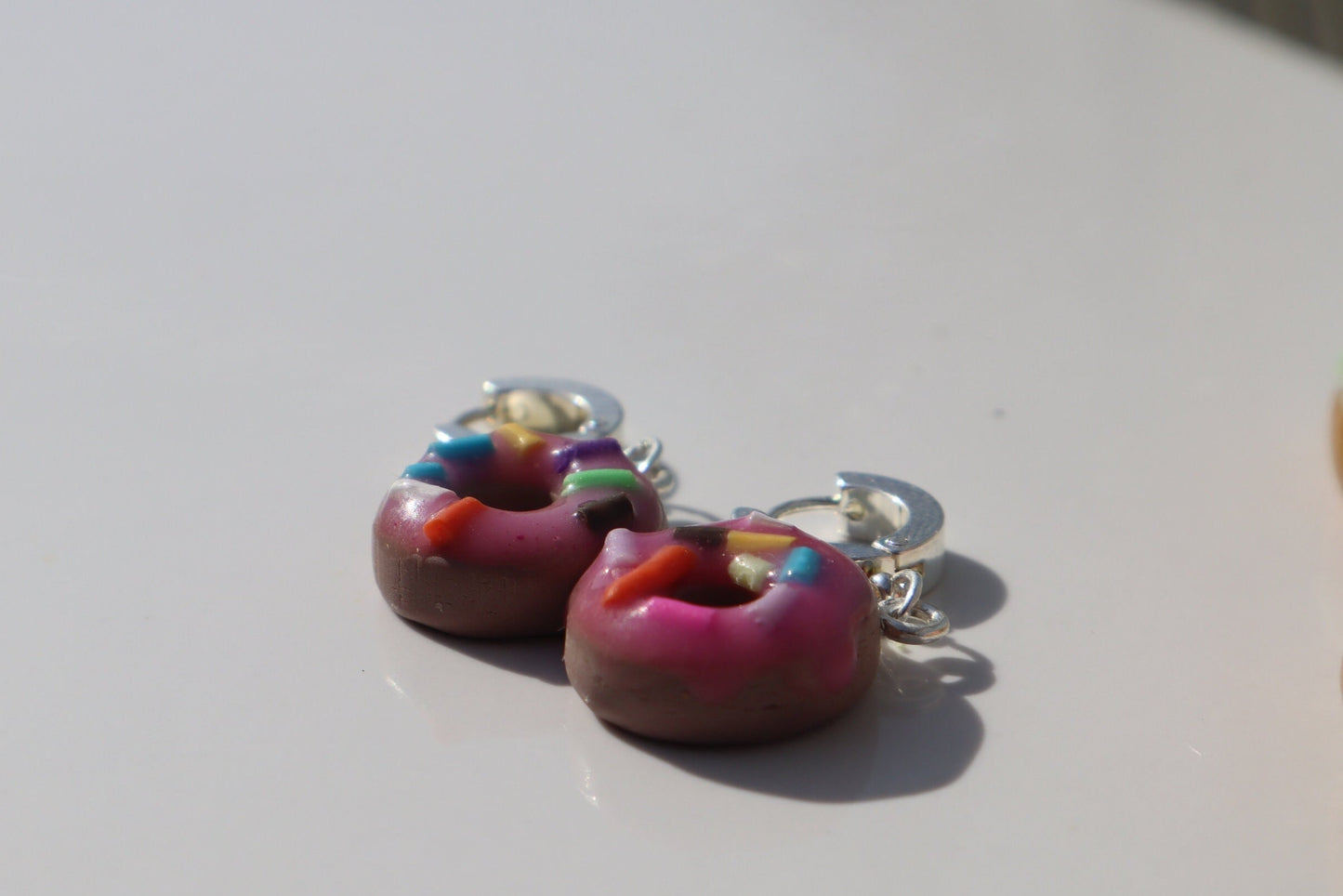 Miniature iced sprinkle doughnut Huggys stainless steel huggys 10/12mm lightweight handmade beautiful unique earrings, polymer clay doughnut