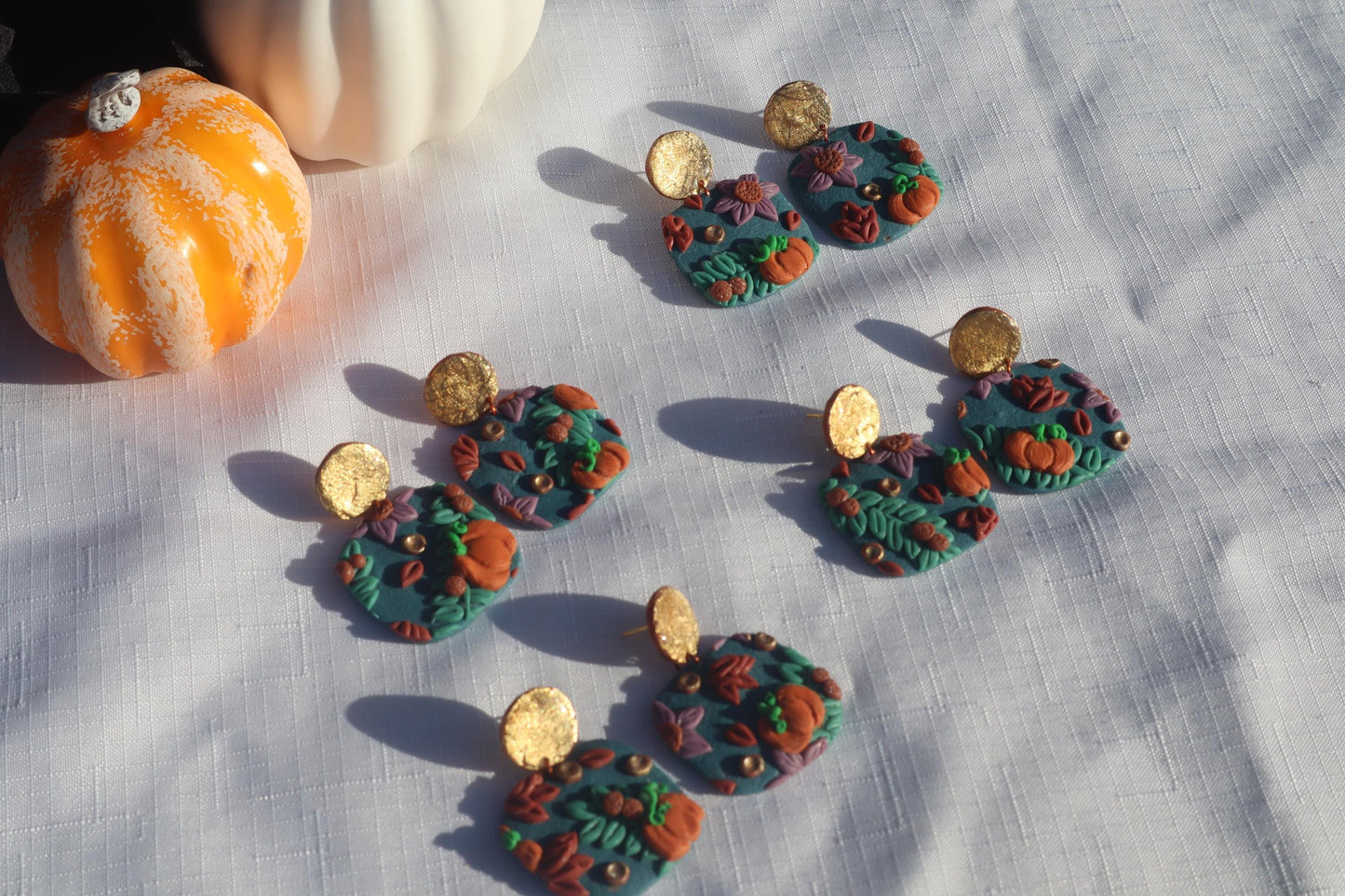 Halloween inspired pumpkin patch dangles,polymer clay lightweight with resin, handmade beautiful earrings, Nickel free findings. Seconds