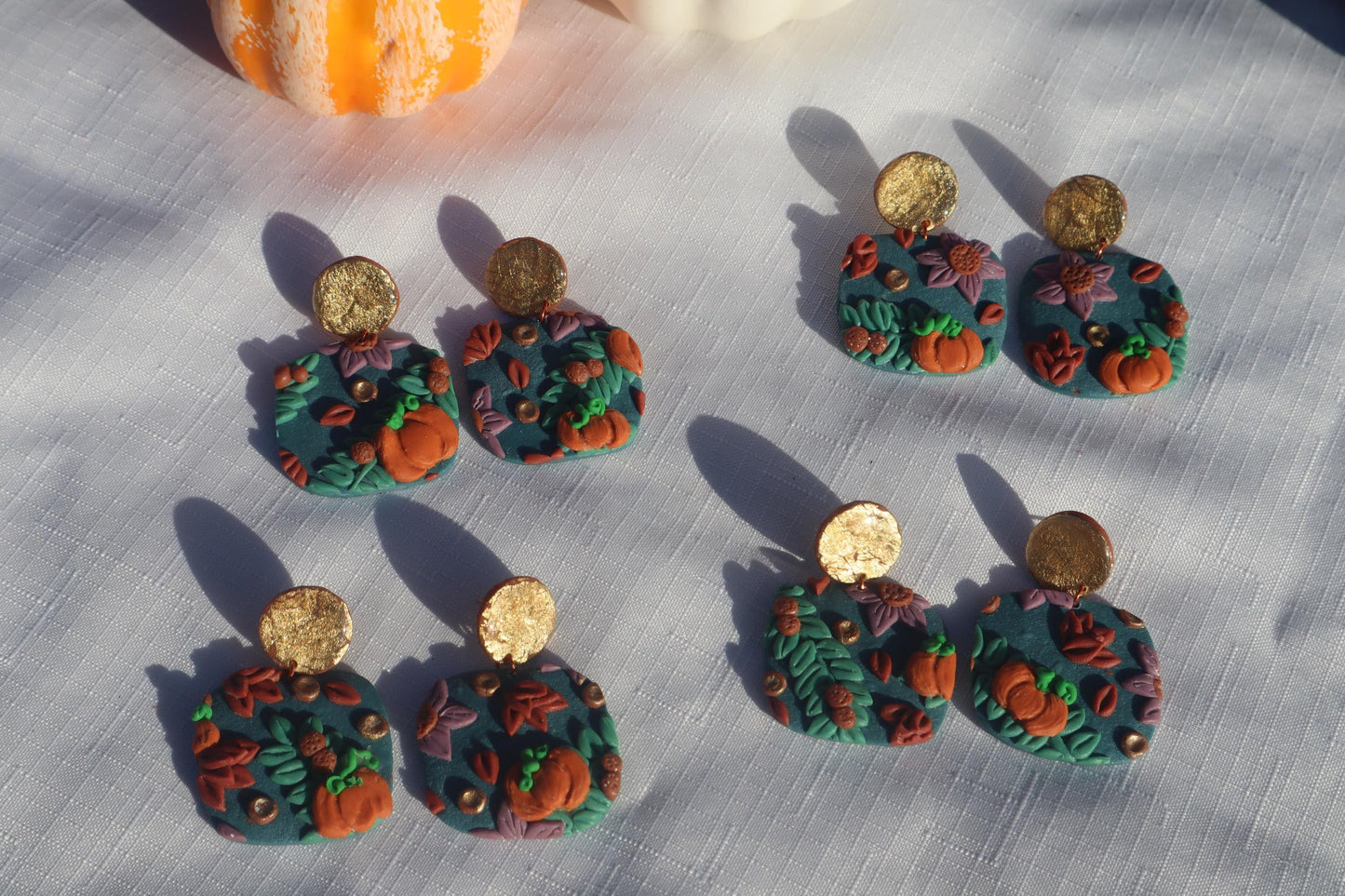 Halloween inspired pumpkin patch dangles,polymer clay lightweight with resin, handmade beautiful earrings, Nickel free findings. Seconds