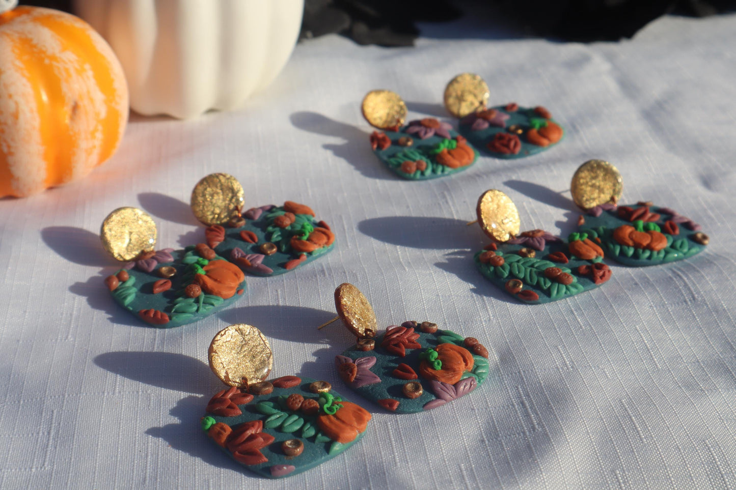 Halloween inspired pumpkin patch dangles,polymer clay lightweight with resin, handmade beautiful earrings, Nickel free findings. Seconds