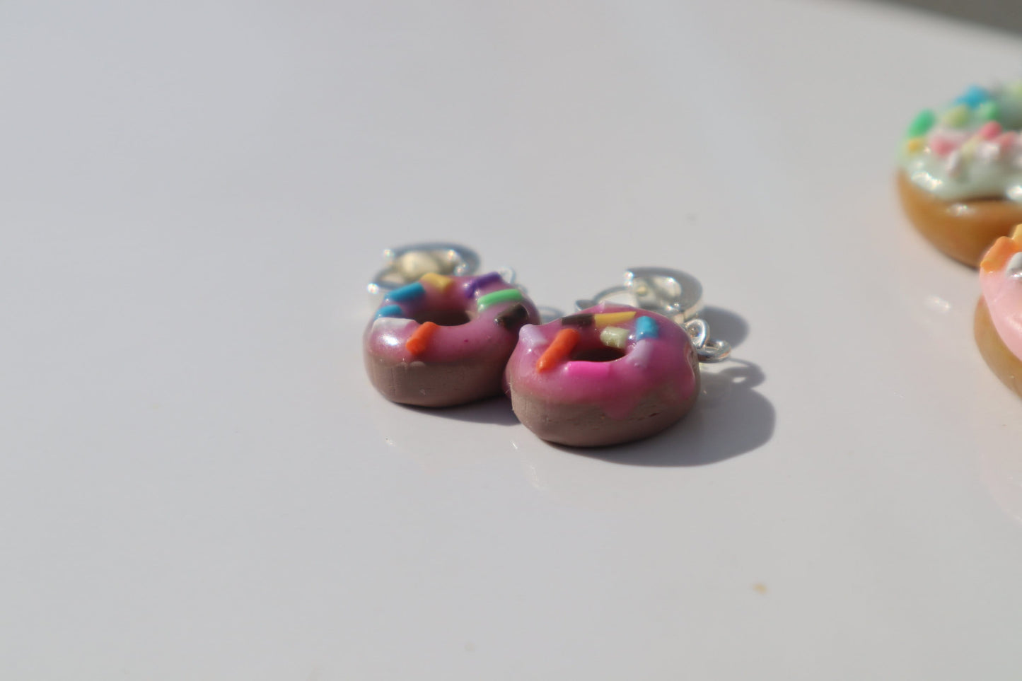 Miniature iced sprinkle doughnut Huggys stainless steel huggys 10/12mm lightweight handmade beautiful unique earrings, polymer clay doughnut