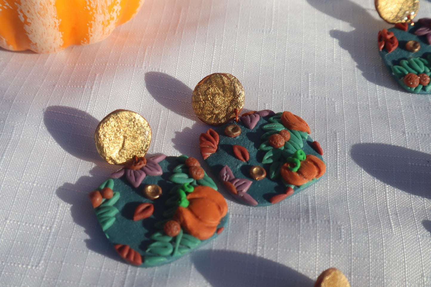 Halloween inspired pumpkin patch dangles,polymer clay lightweight with resin, handmade beautiful earrings, Nickel free findings. Seconds