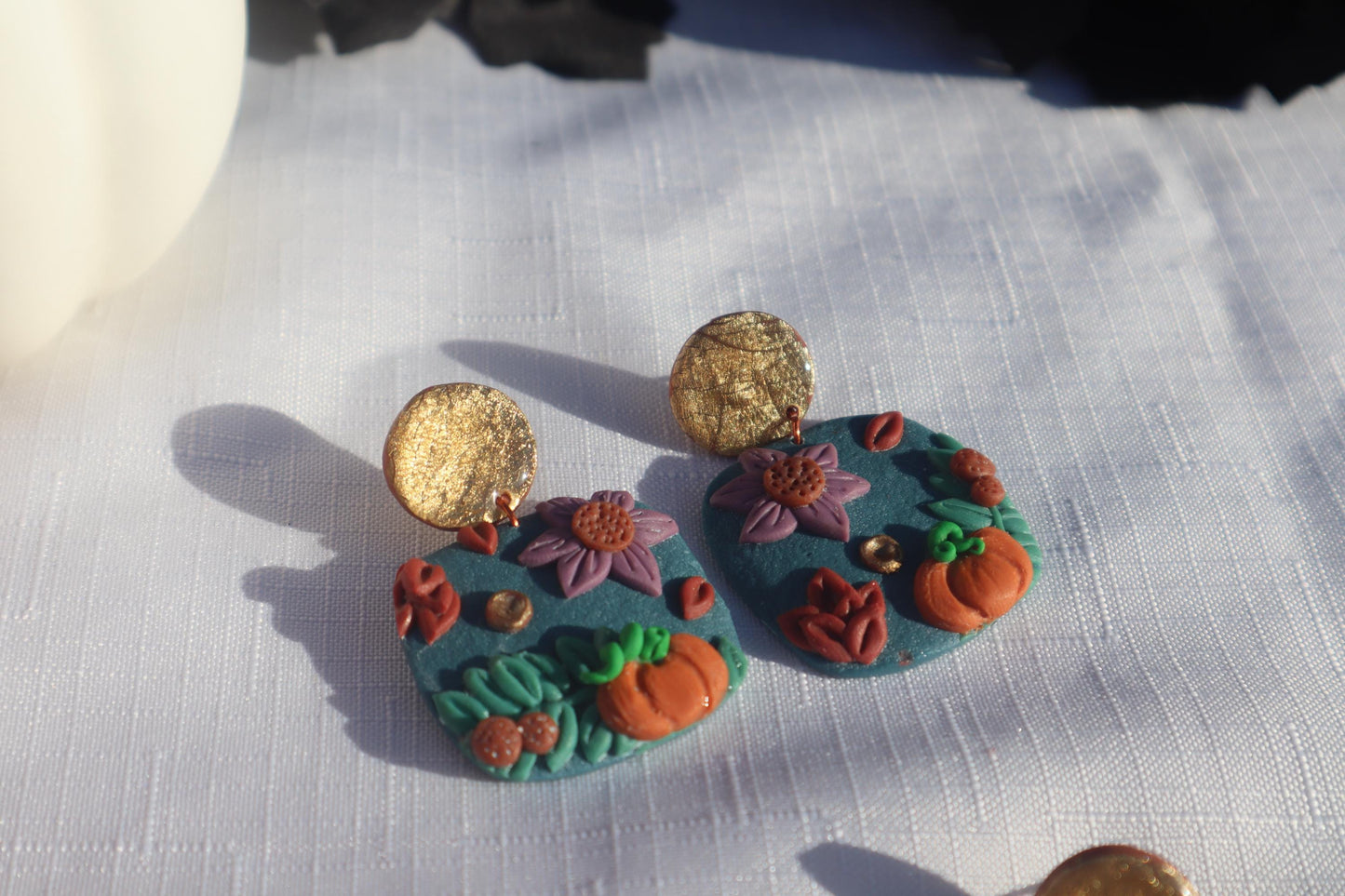 Halloween inspired pumpkin patch dangles,polymer clay lightweight with resin, handmade beautiful earrings, Nickel free findings. Seconds