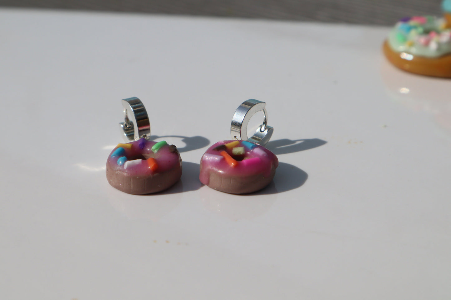 Miniature iced sprinkle doughnut Huggys stainless steel huggys 10/12mm lightweight handmade beautiful unique earrings, polymer clay doughnut