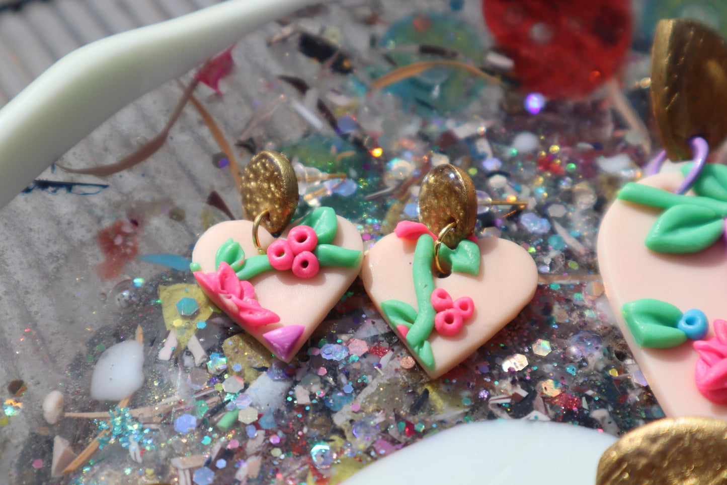 VC pick ‘a’ mix dangles. Mixed media. Have small flaws. All are discounted and have nickel free findings and resin backs