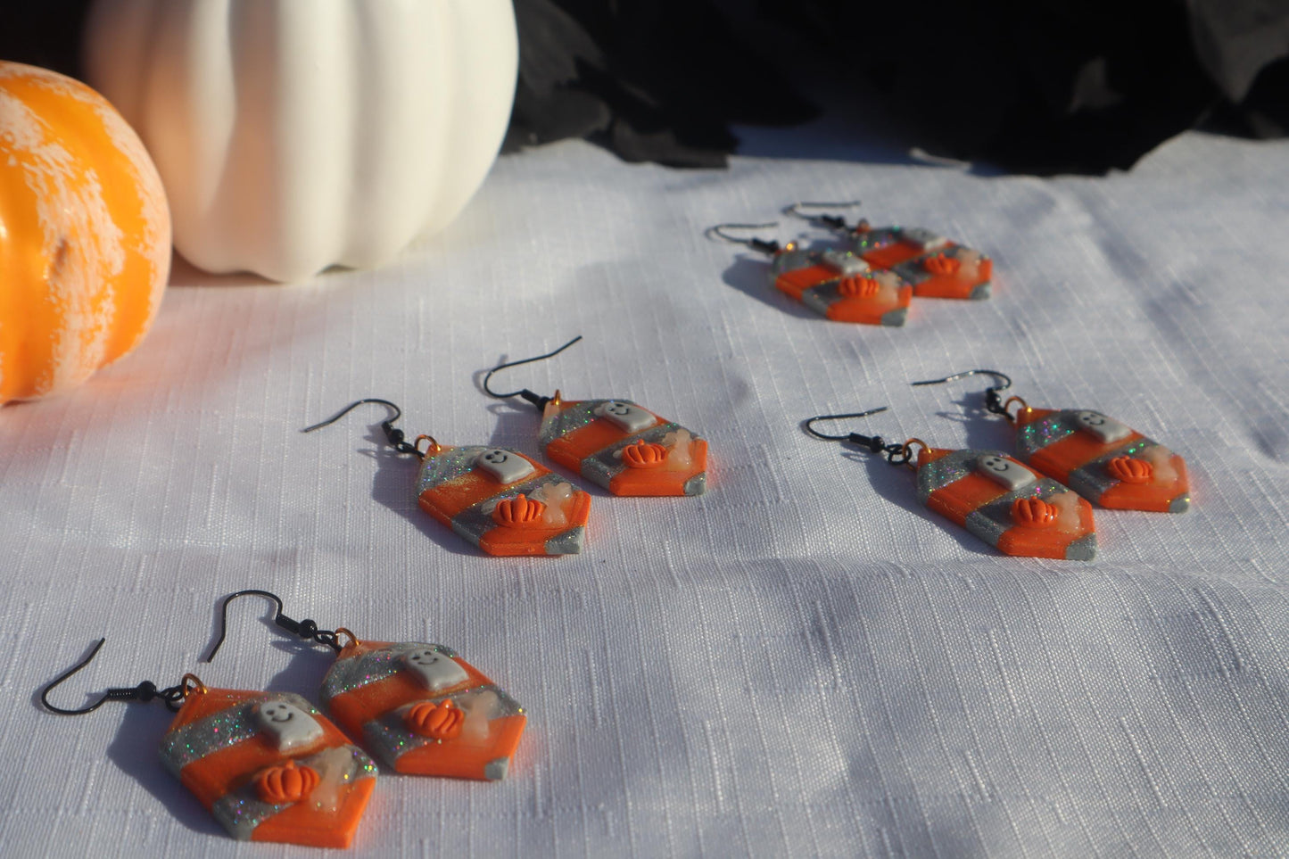 Halloween inspired dangles,polymer clay lightweight with resin, handmade beautiful earrings, Nickel free findings. Beetle juice and ghostly