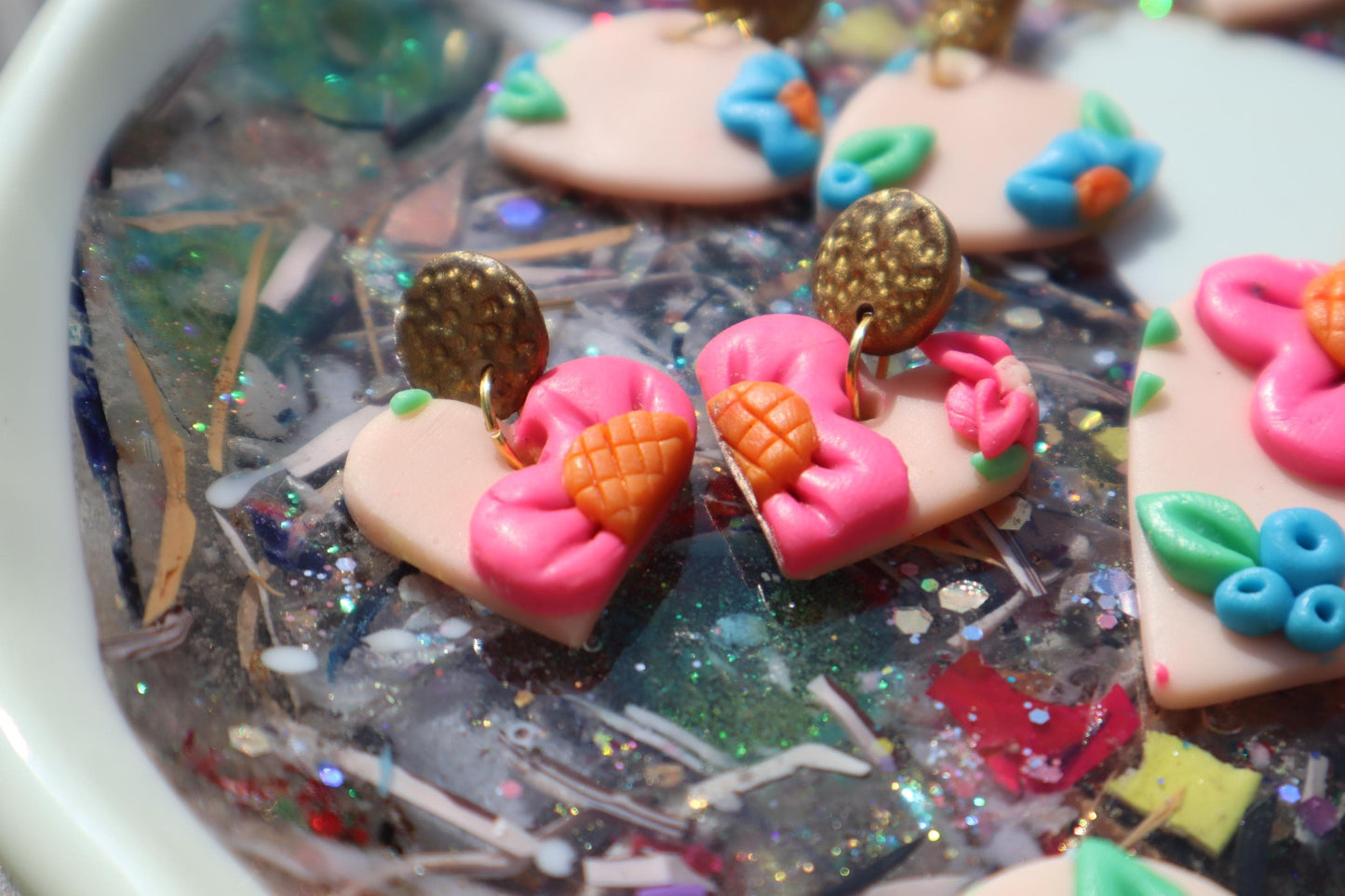 VC pick ‘a’ mix dangles. Mixed media. Have small flaws. All are discounted and have nickel free findings and resin backs