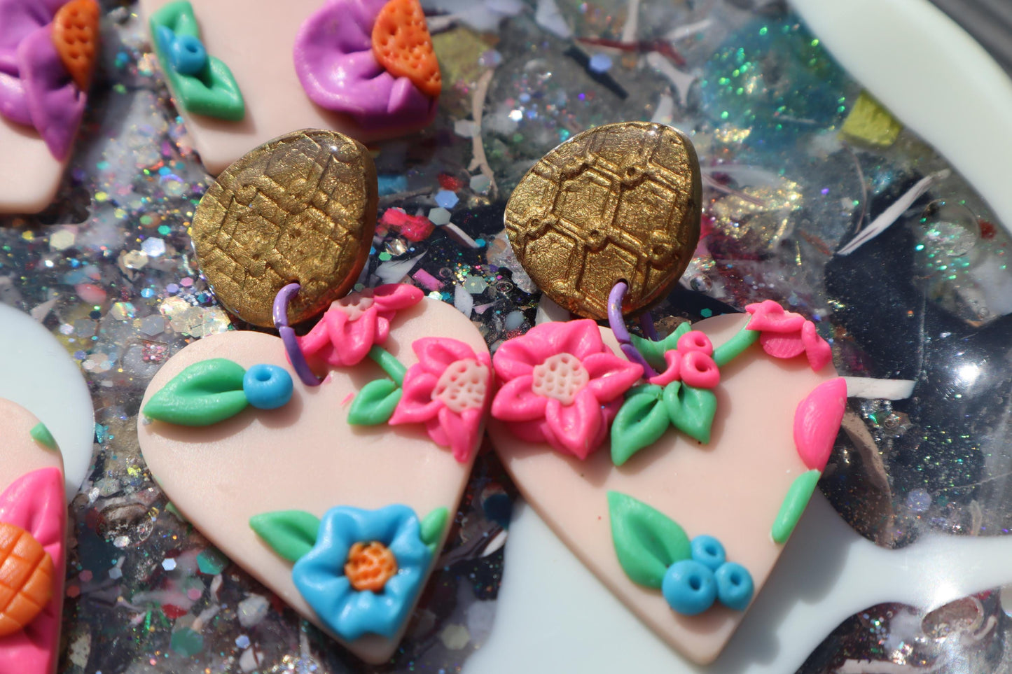 VC pick ‘a’ mix dangles. Mixed media. Have small flaws. All are discounted and have nickel free findings and resin backs