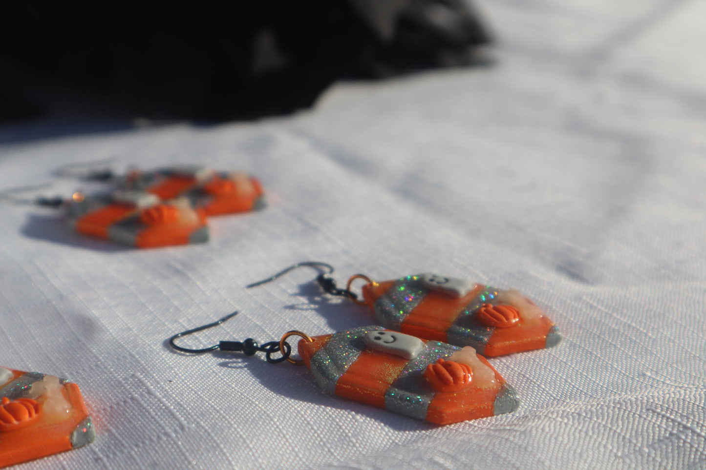 Halloween inspired dangles,polymer clay lightweight with resin, handmade beautiful earrings, Nickel free findings. Beetle juice and ghostly