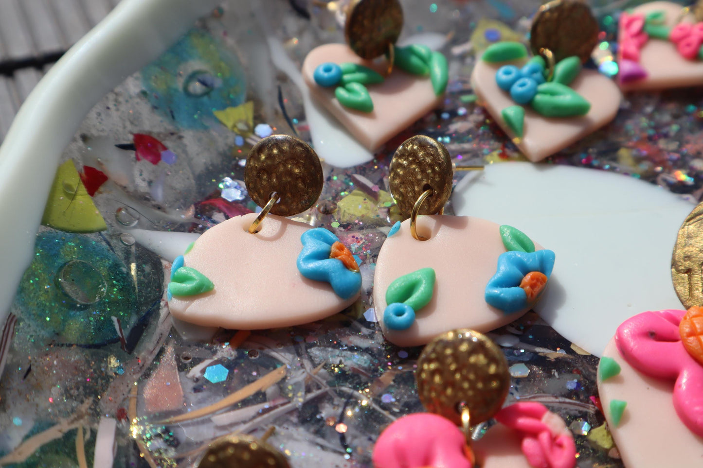 VC pick ‘a’ mix dangles. Mixed media. Have small flaws. All are discounted and have nickel free findings and resin backs
